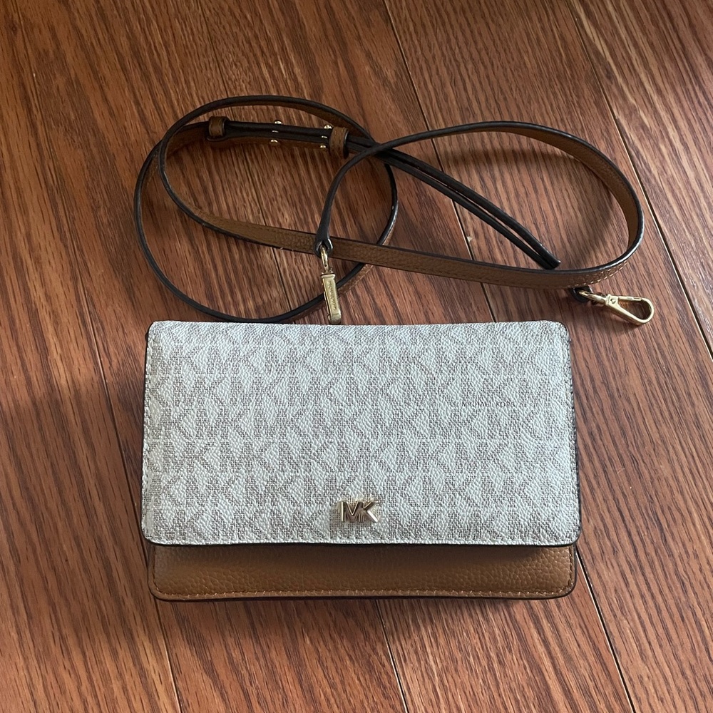 Michael Khors wallet with over the shoulder strap